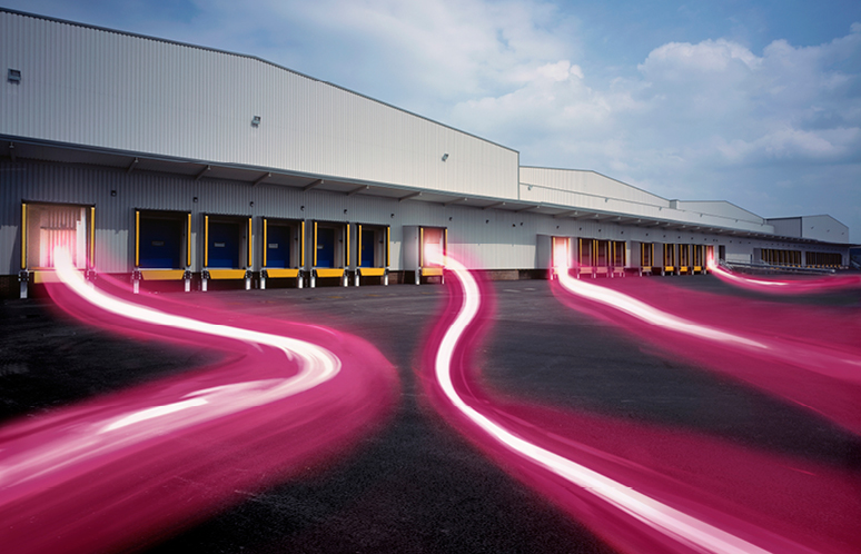 Eine Logistikhalle mit LKW-Ladetoren aus denen weiß-pinke Lichter gemalt wurden